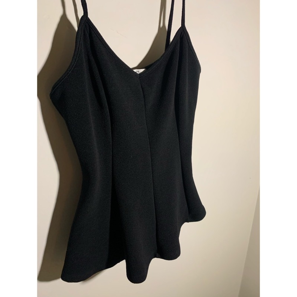 New. Black waist flattering shirt